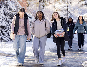 Photo of students walking on a snowy campus. Link to Gifts That Pay You Income.